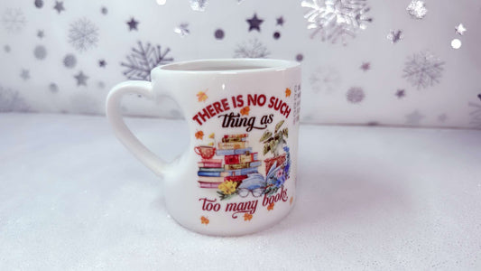 There is no such thing as too many books, 11oz Heart Mug